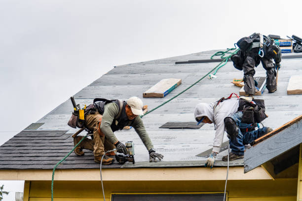 Professional Gutter Installation technician working in North Bend, OR